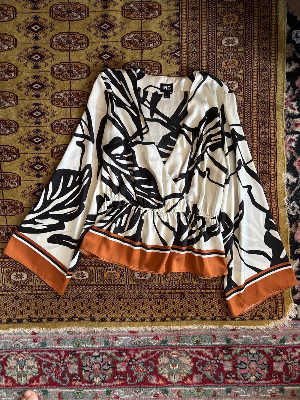 INC International Concepts Black & White Abstract Wrap Top with Rust Hem